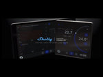 Пулт за управление със Smart реле 1х On/Off 5A изисква неутрала черен Shelly Wall Display X2 - 072315, SHELLY, показващ температурни данни.